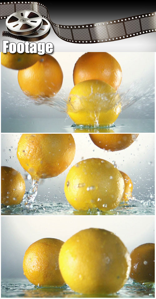 Video footage Orange splashing into water, slow motion