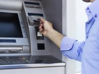 «Укрсоцбанк» приостановил зачисление валюты сквозь банкоматы из-за появления фальшивых стодолларовых банкнот